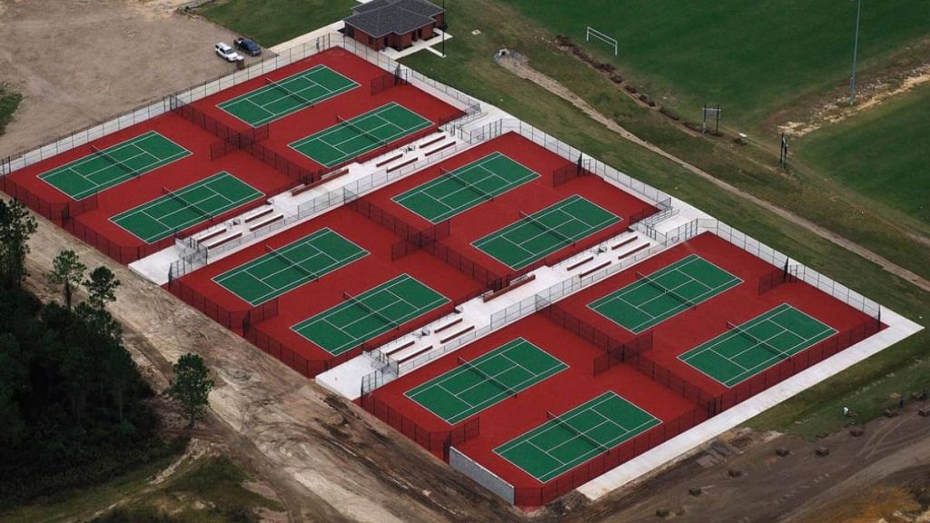 A Tennis Courts In A Large Area