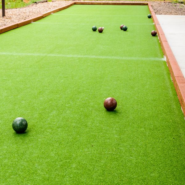 Bocce Balls Lined Up On A Bocce Court Outside