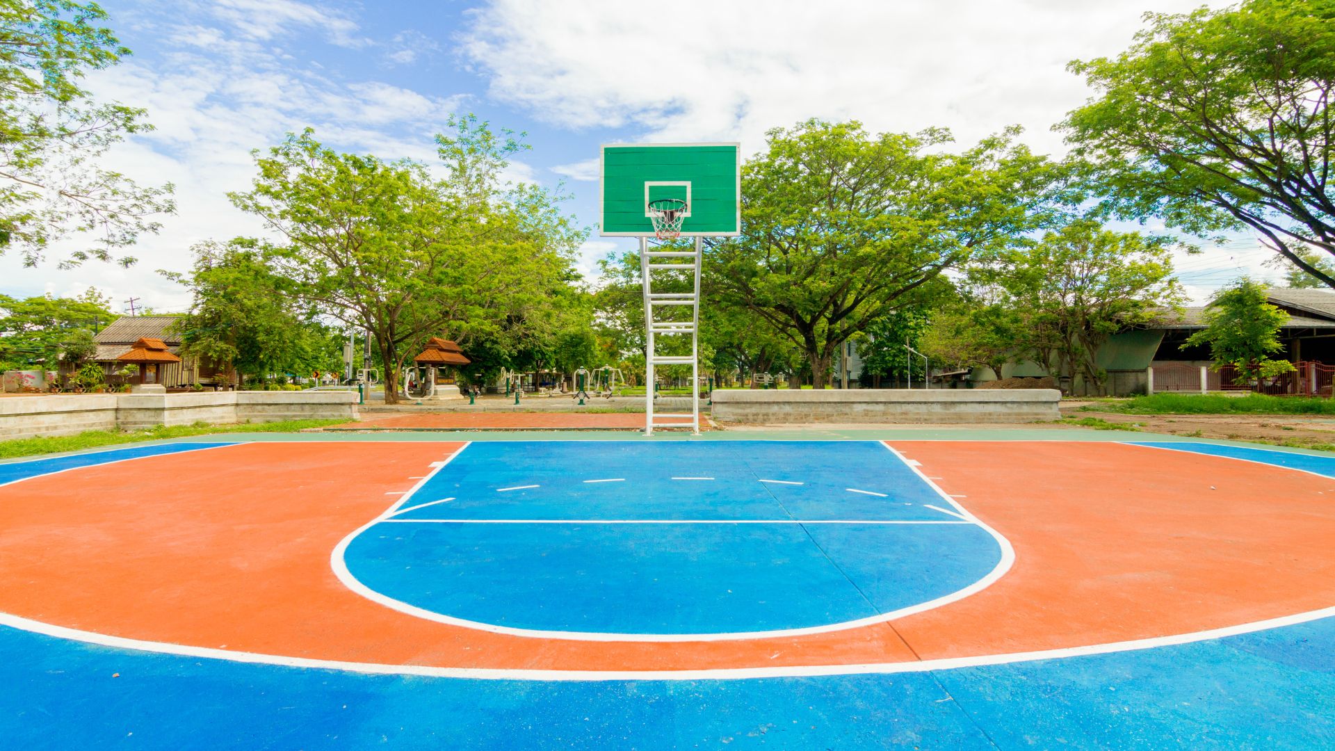 Basketball Court With Blue And Orange Flooring